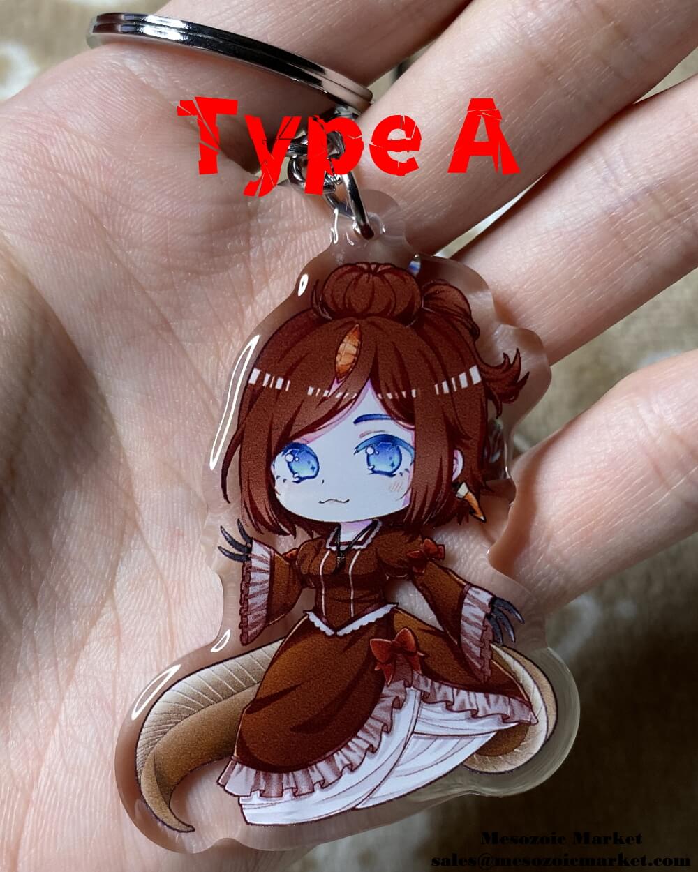 Type A variant of an acrylic keychain of our Spinosaurus anime girl mascot.