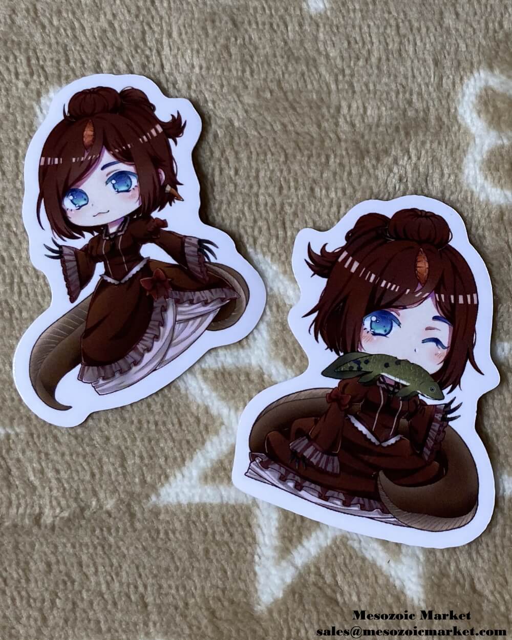 Pair of vinyl stickers of our Spinosaurus anime girl mascot.